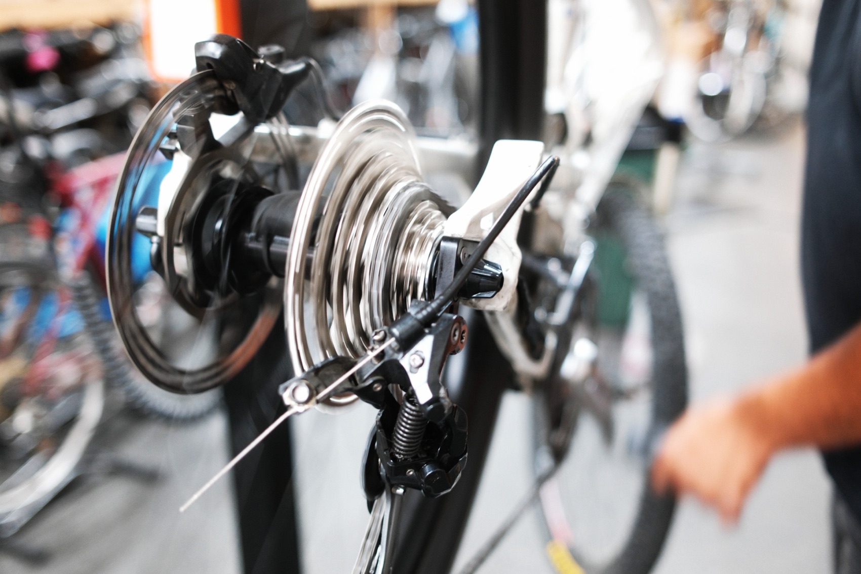 Close-up of a bike hub and brake during service